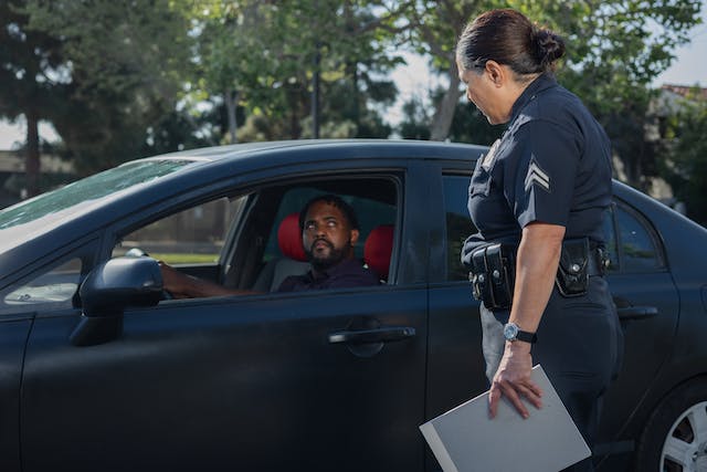 police officer talking to driver