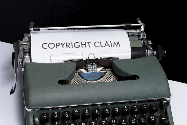 typewriter with "copyright claim" on paper